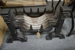 A good pair of cast iron firedogs with grate.