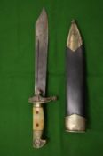 A German military knife with scabbard by Eickhorn, Solingen.