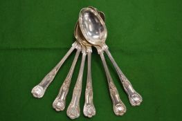 Six silver dessert spoons.