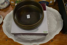A large turkey dish and other items.