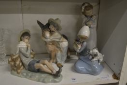 Three Lladro figures and a Neo figure.