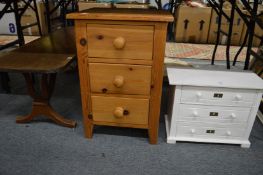A painted miniature chest of drawers, a pine bedside chest and a coffee table.