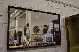 A Chinese hardwood framed rectangular wall mirror.