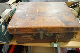 A leather shotgun cartridge case.