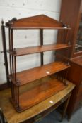 A Victorian mahogany wall shelf.