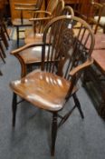 A 19th century ash, beech and elm wheelback armchair.