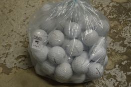 A bag of Taylor Made golf balls.