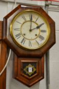 Two regulator style wall clocks.