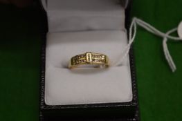 A 14ct gold and diamond ring.