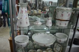 A seven piece floral decorated bedroom wash set.