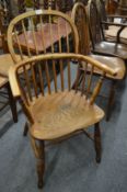 A 19th century ash and elm stickback Windsor armchair.