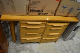 An oak office table and two filing chests.