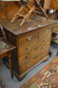 An 18th century oak chest of drawers.