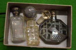 Silver mounted scent bottles.