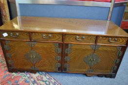 A Chinese hardwood low cabinet.