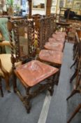 A good set of six Carolean style walnut high back dining chairs with cane work back and seat and