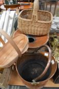 A copper coal scuttle, wicker basket, small trug and copper spittoon.