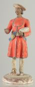 AN INDIAN PAINTED POTTERY FIGURE, 20.5cm high.
