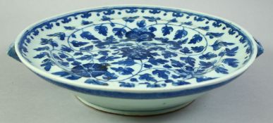 A CHINESE BLUE AND WHITE PORCELAIN WARMING DISH, possibly 18th century, with floral decoration, 28cm