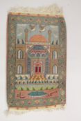 A SMALL 19TH CENTURY PICTORIAL TABRIZ RUG, with image of a mosque, 84cm x 54cm.