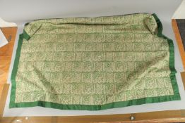 A CALLIGRAPHIC TEXTILE.