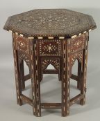 A MOORISH BONE INLAID OCTAGONAL TABLE, 48cm high.