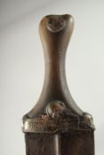 A 19TH CENTURY ARAB OMANI HORN HILTED JAMBIYA DAGGER, 30.5cm long.