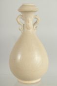 A CHINESE TWIN HANDLE POTTERY VASE, 20.5cm high.