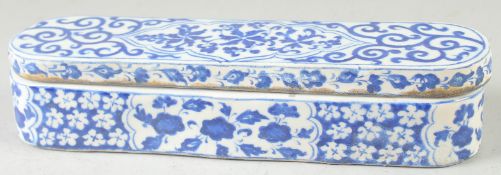A TURKISH BLUE AND WHITE POTTERY PEN BOX, 28.5cm long.
