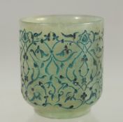 A RARE ISLAMIC OTTOMAN ENGRAVED JADE CUP, 6cm high.