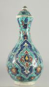 A FINE OTTOMAN TURKISH KUTAHIYA POTTERY LIDDED BOTTLE VASE, signed; possibly by master Hilmi of