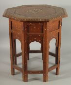 A MOORISH BONE INLAID WOODEN OCTAGONAL TABLE, 47.5cm high.