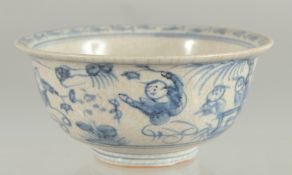 A CHINESE BLUE AND WHITE PORCELAIN BOWL, painted with boys, 14cm diameter.