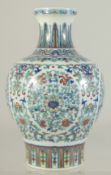 A FINE CHINESE DOUCAI PORCELAIN VASE, decorated with fine foliate scrolls and floral motifs, the