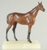 A BERGMAN-STYLE COLD PAINTED FIGURE OF A HORSE, mounted to a rectangular onyx base, 16cm high.