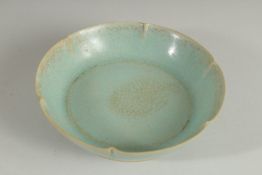 A CHINESE CELADON GLAZE PETAL-FORM BOWL, 14.5cm diameter.