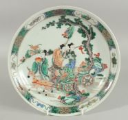 A CHINESE FAMILLE VERTE PORCELAIN PLATE, with female figures and deer, six-character mark to base,