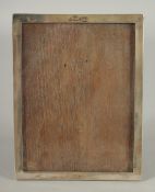 AN IRAQI NIELLO SILVER PICTURE FRAME, with inscription and hallmarks, 22cm x 17cm.