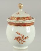 A CHINSE COPPER RED AND WHITE PORCELAIN CUP AND COVER, painted with flora and fine gilt highlights.