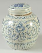 A CHINESE BLUE AND WHITE PORCELAIN JAR AND COVER, decorated with floral motifs, 16cm high.