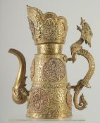 A FINE 18TH-19TH CENTURY TIBETAN BRASS EWER, with pierced copper roundels depicting various