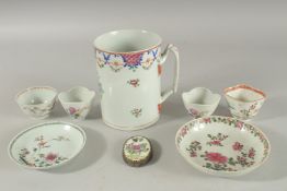 A COLLECTION OF CHINESE FAMILLE ROSE PORCELAIN ITEMS; comprising a tankard, two saucers, a tea bowl,