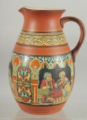 A TURKISH TERRACOTTA JUG, with glazed interior, 16cm high