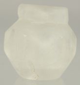 A SMALL ISLAMIC CARVED ROCK CRYSTAL VESSEL, 3cm high.