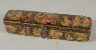 A SMALL 19TH CENTURY PERSIAN PEN BOX, with painted portraits, 11cm long.