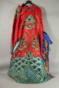 A CHINESE SILK ROBE, with gilt-threaded embroidered dragons.