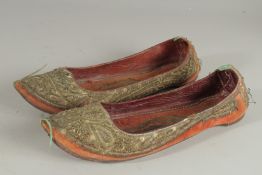A PAIR OF TURKISH EMBROIDERED SHOES.