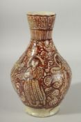 AN ISLAMIC QAJAR GLAZED POTTERY VESSEL, painted with figures, 26.5cm high.