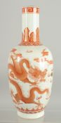 A CHINESE CORAL RED AND WHITE PORCELAIN DRAGON VASE, with gilt highlights and character mark, 30.5cm