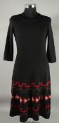 A RALPH LAUREN 100% WOOL KNITTED DRESS, black with red and cream design, Size L.